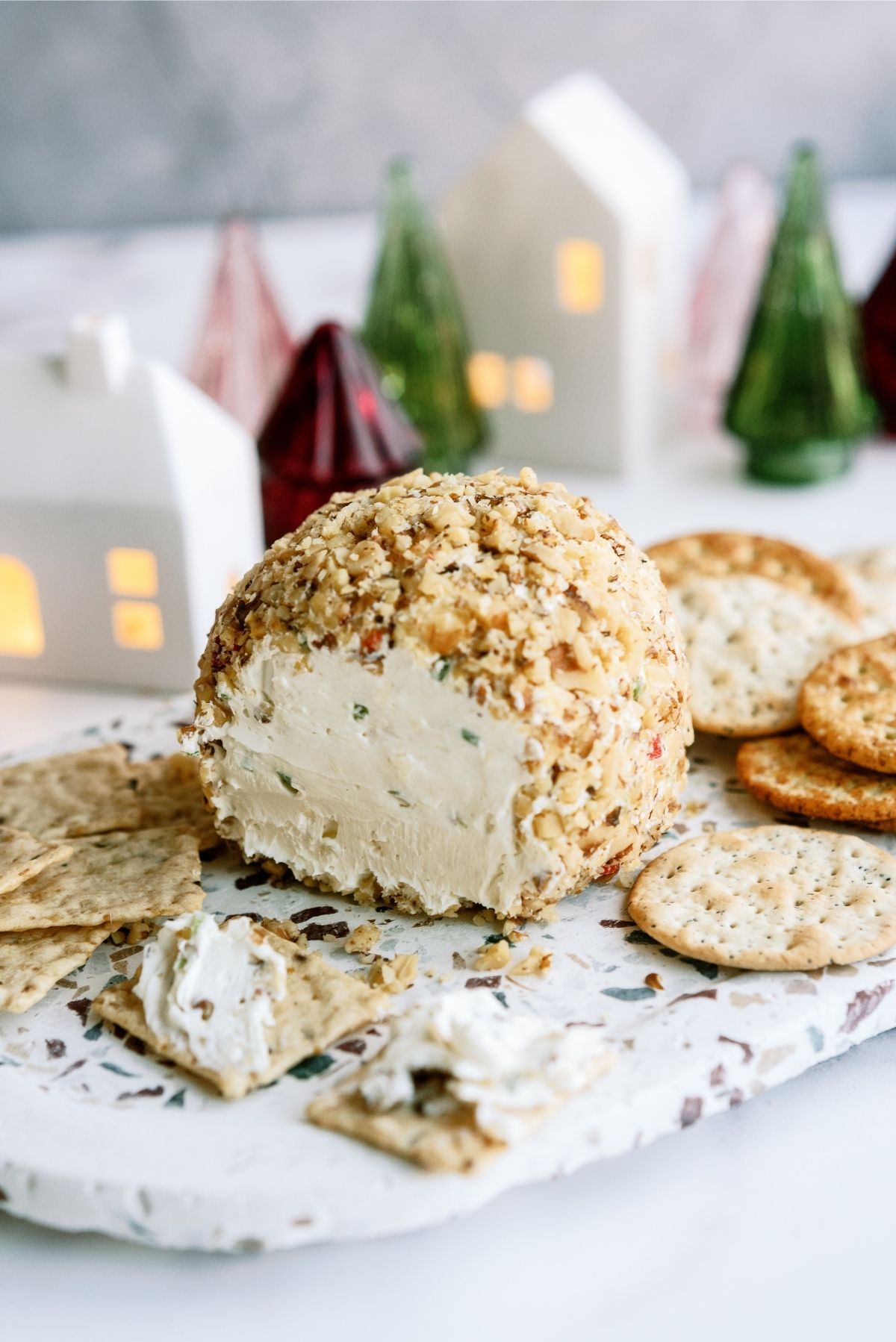 Grandma’s Holiday Cheese Ball on a platter with crackers
