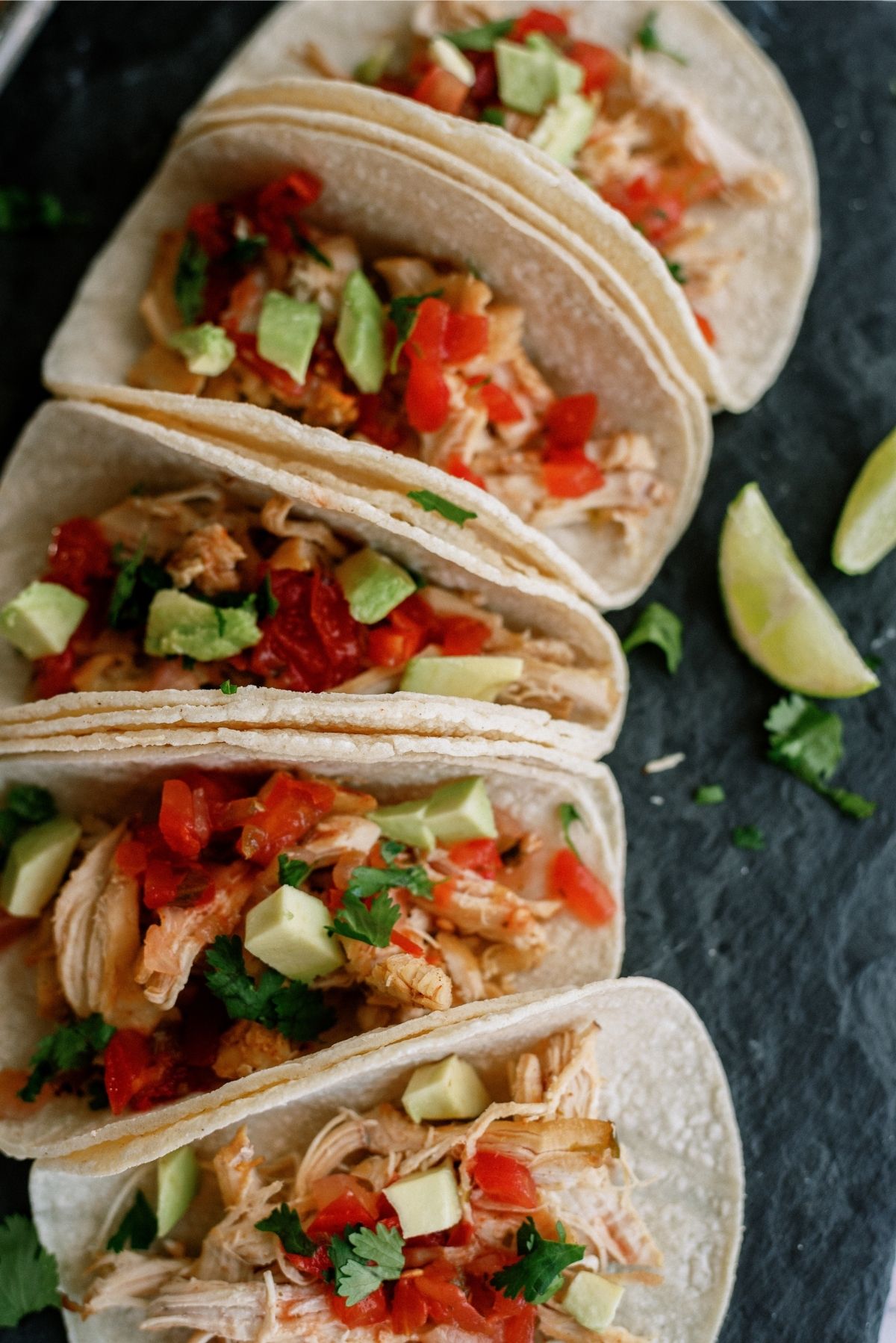 Instant Pot Chicken Carnitas in tortillas with toppings