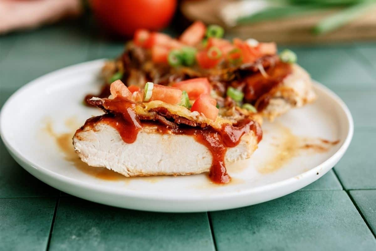 Monterey Chicken on a white plate sliced