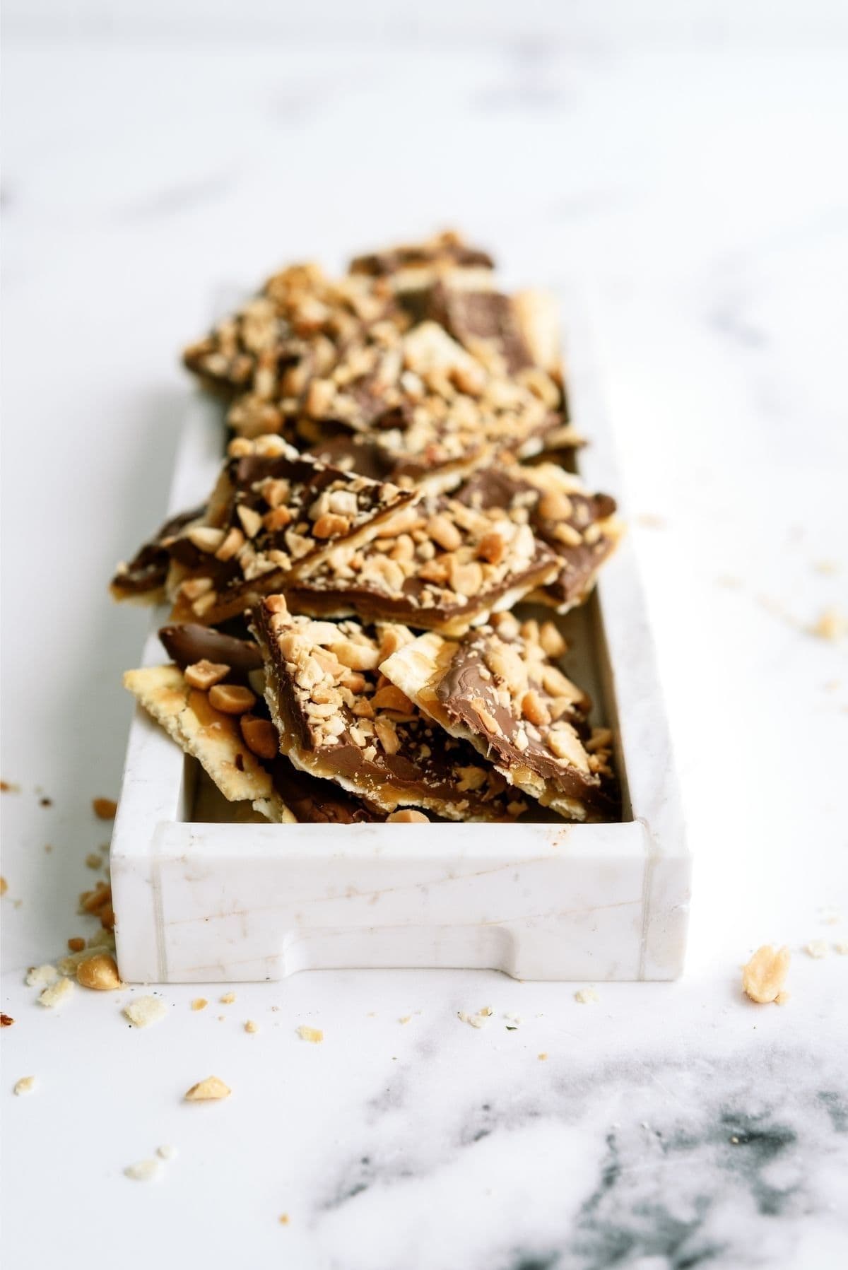 Saltine Cracker English Toffee broken into pieces in a serving dish