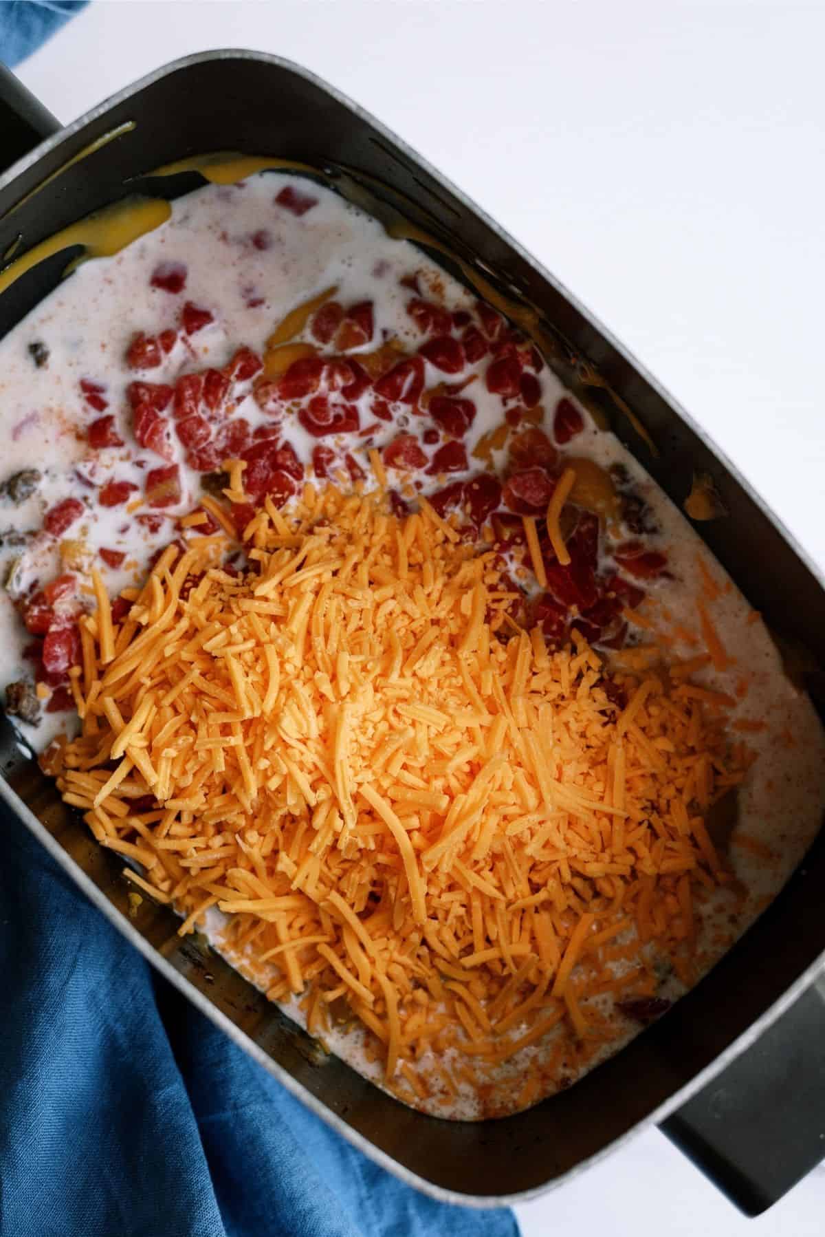 Remaining ingredients added to slow cooker on top of browned beef