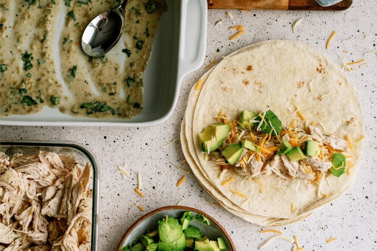 Tortillas topped with chicken, cheese and avocado