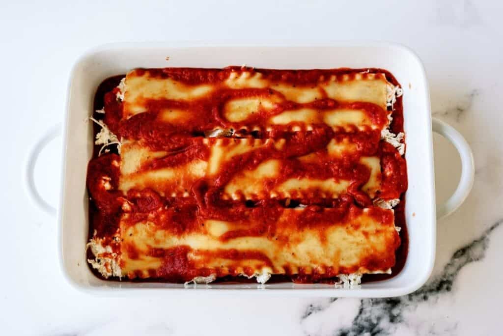 Creamy Chicken Lasagna in a casserole dish, ready to bake.