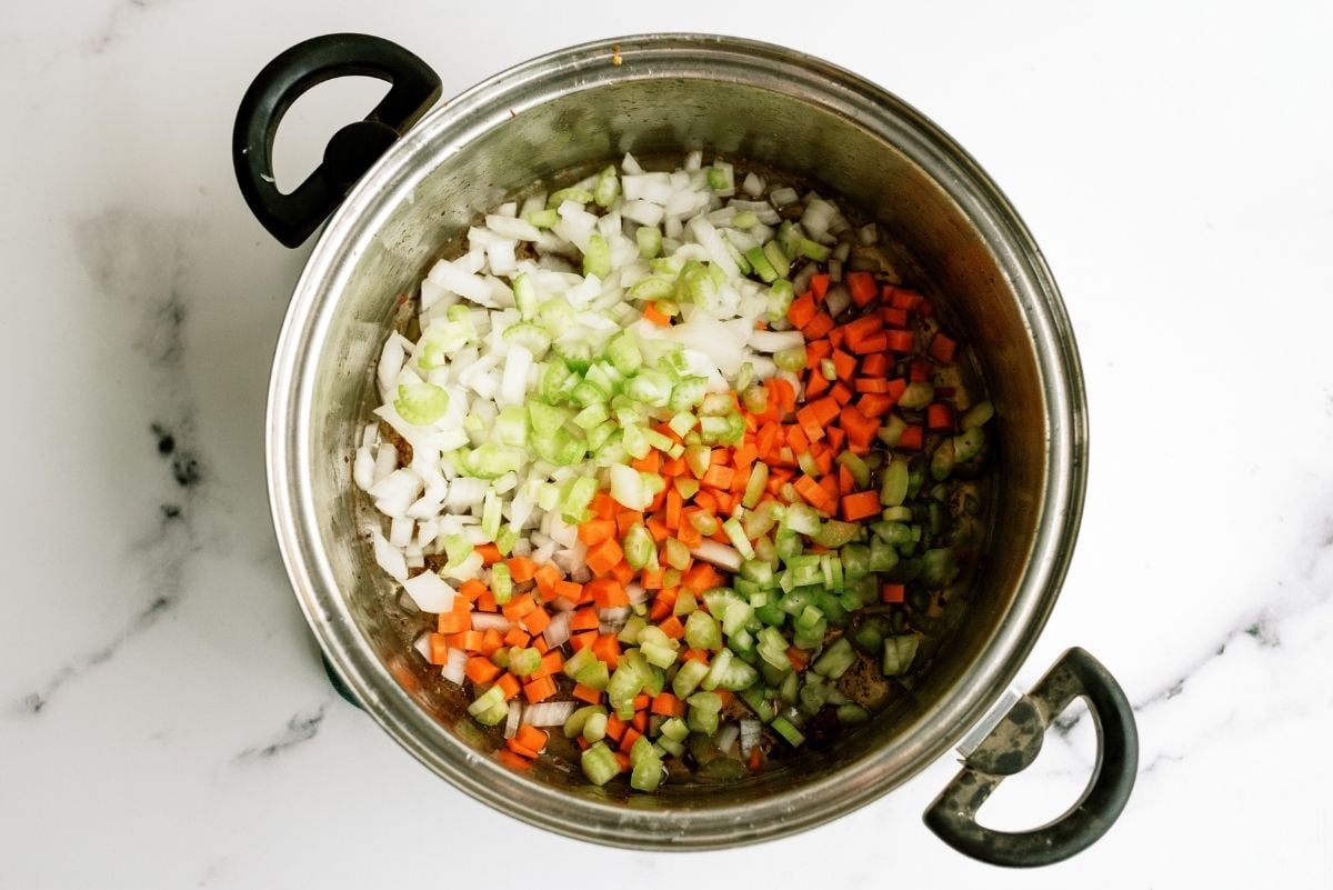 Chopped onions, celery and carrots in the stock pot