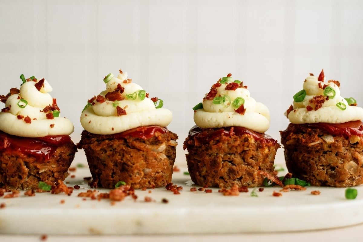 Meatloaf Cupcakes lined up on a cake stand