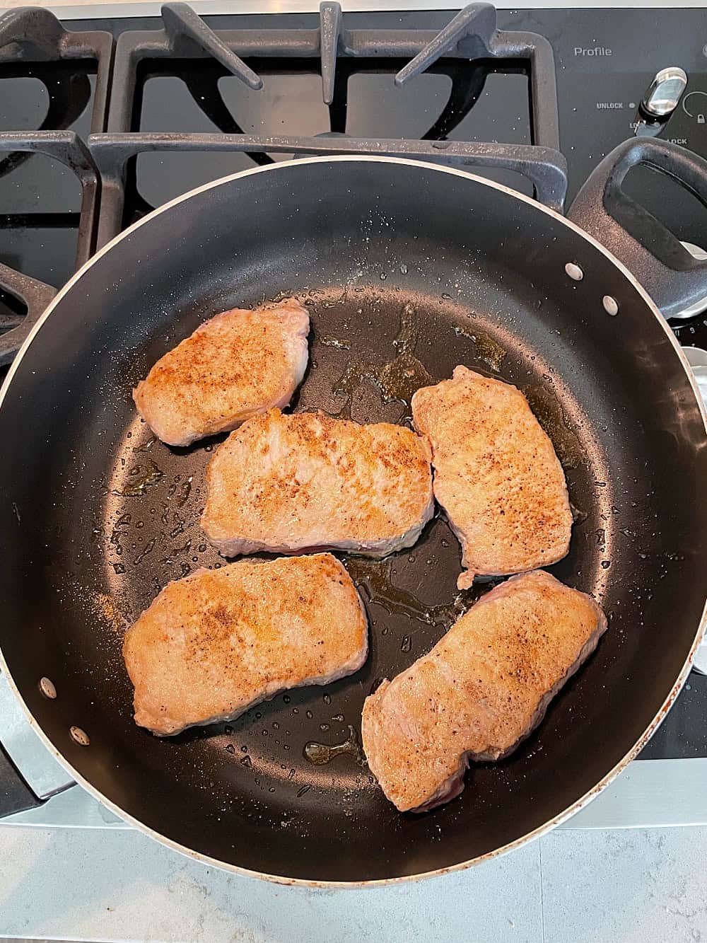 Browning Pork Chops in a skillet