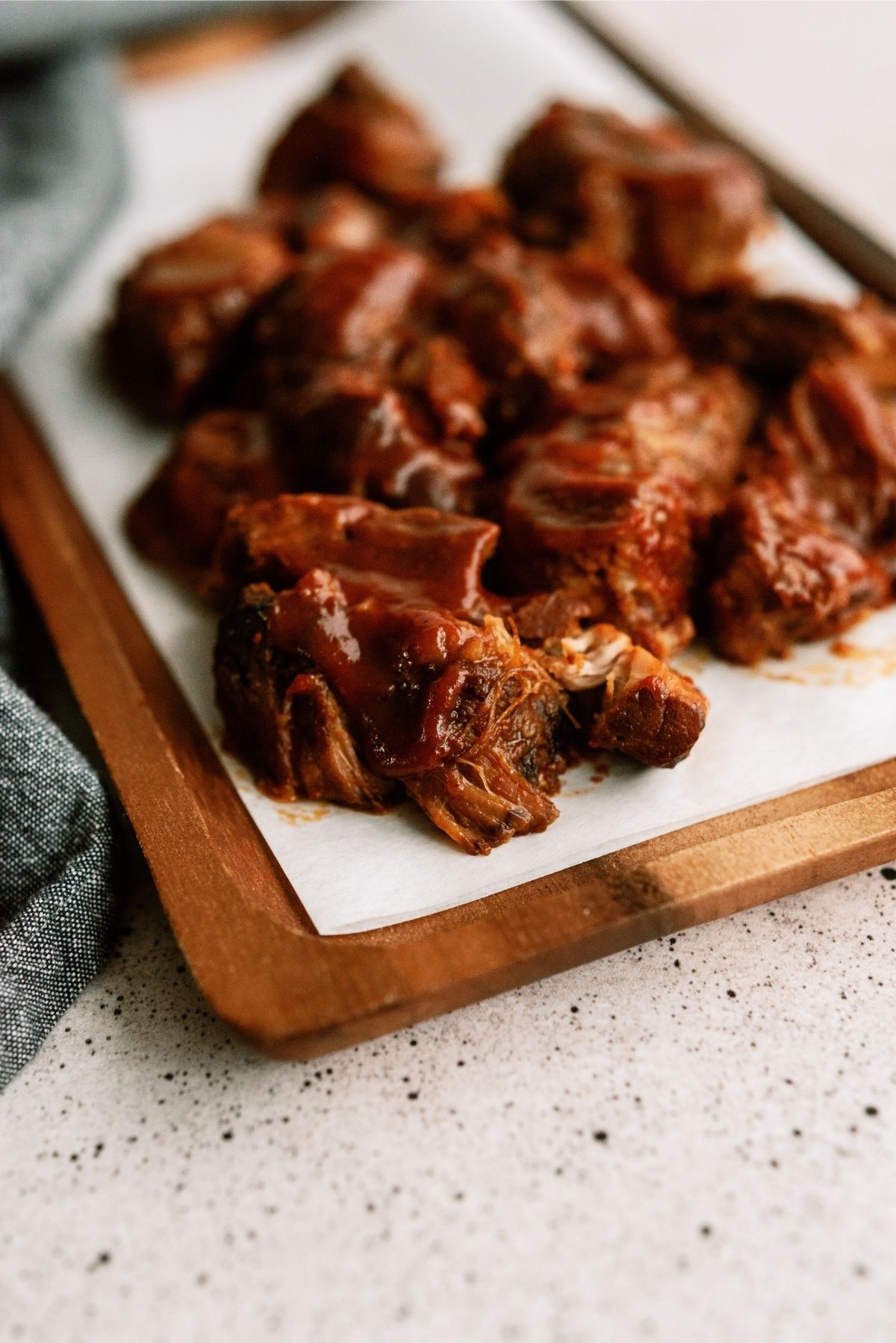 Slow Cooker BBQ Ranch Ribs on a cutting board
