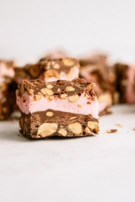 Close up of a Cherry Chocolate Nut Bar with the remaining bars in the background.