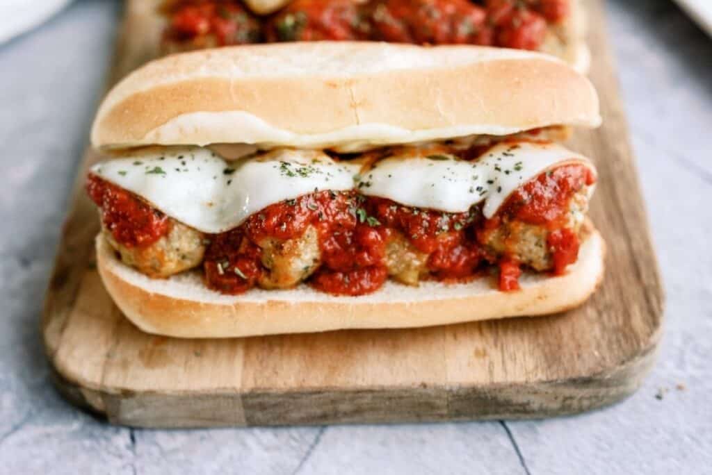 Homemade Turkey Meatball Sub on a cutting board.