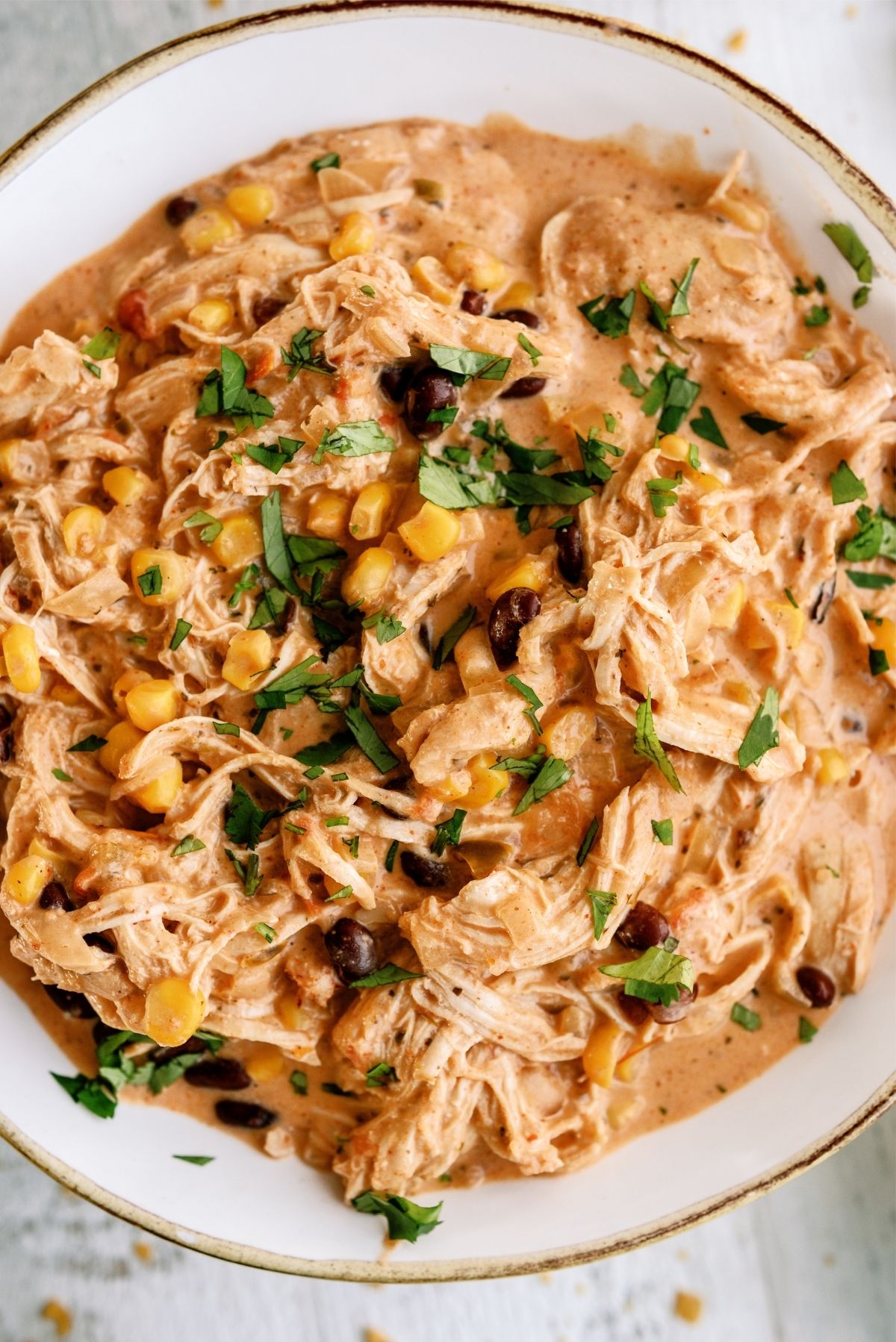 Close up of Instant Pot Creamy Fiesta Chicken in a bowl