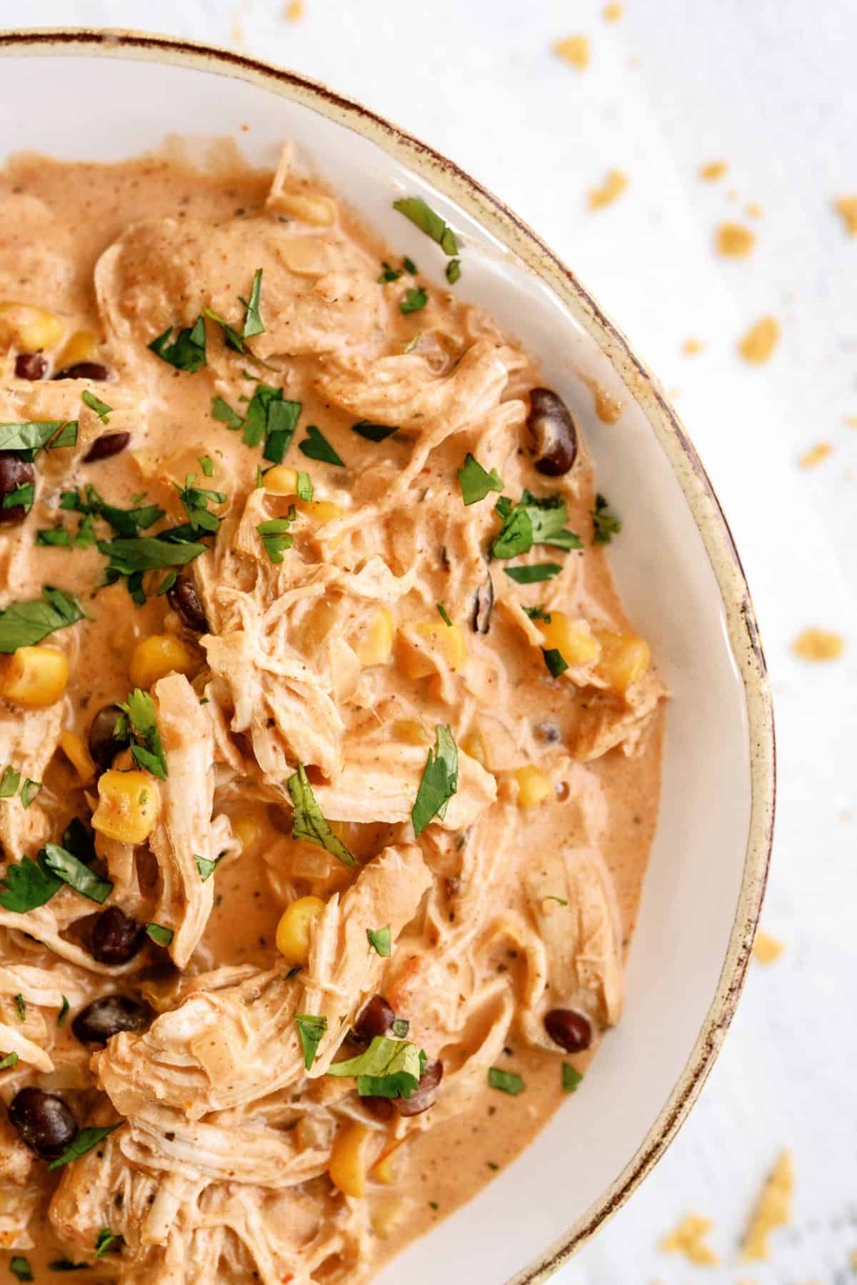 Close up view of Instant Pot Creamy Fiesta Chicken in a bowl