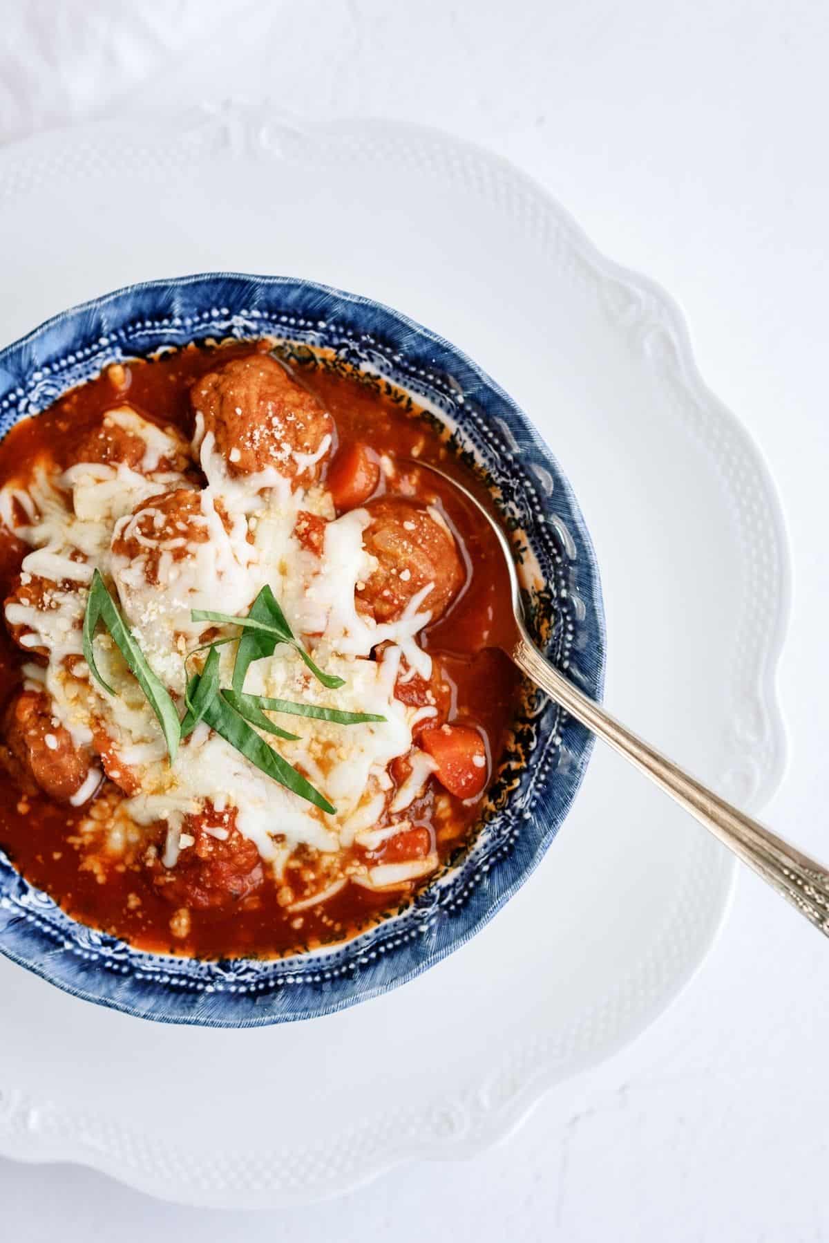 Instant Pot Dump and Go Meatball Soup in a bowl with a spoon