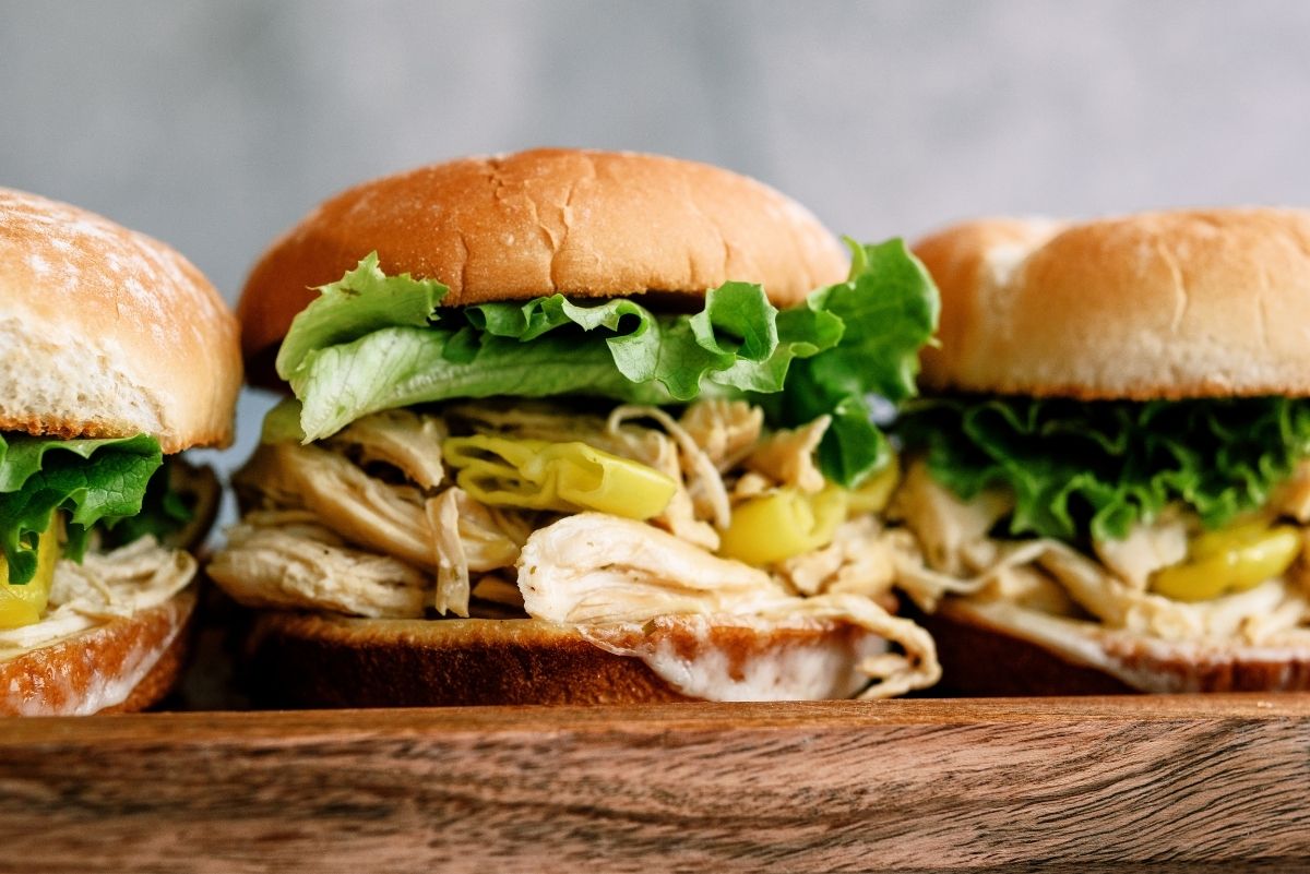 Instant Pot Mississippi Chicken Sandwiches on a serving tray