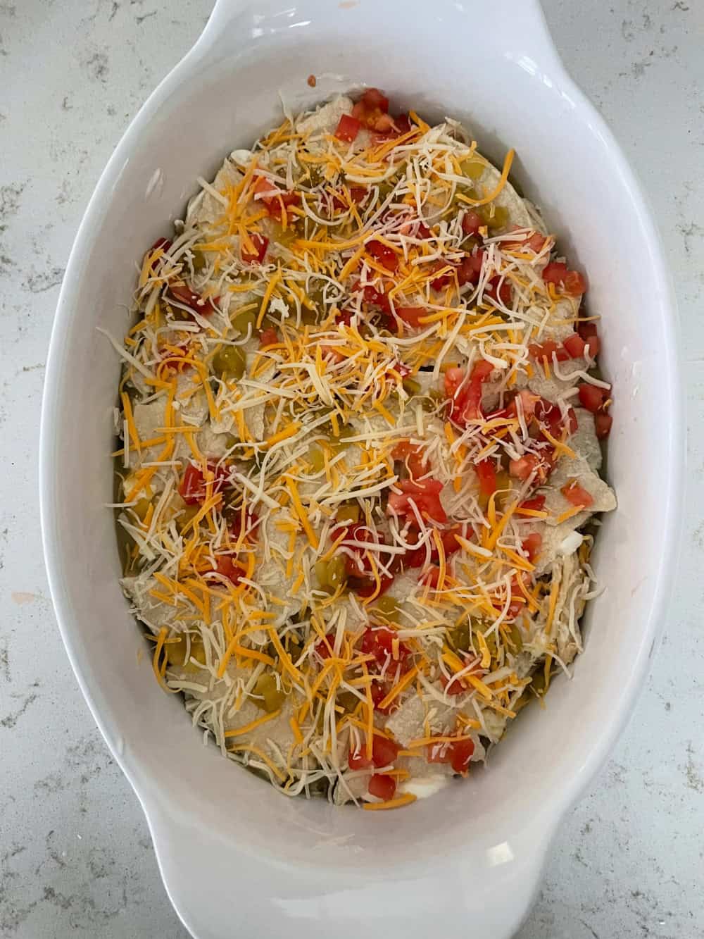 Layer 1 of Easy Southwest Chicken Casserole Bake in casserole dish