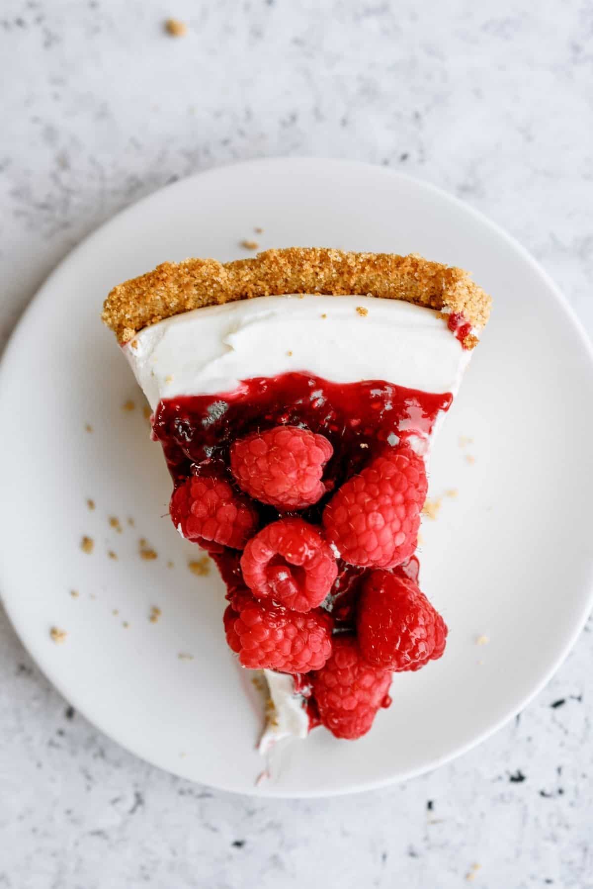 Slice of Raspberry Cream Cheese Pie on a plate