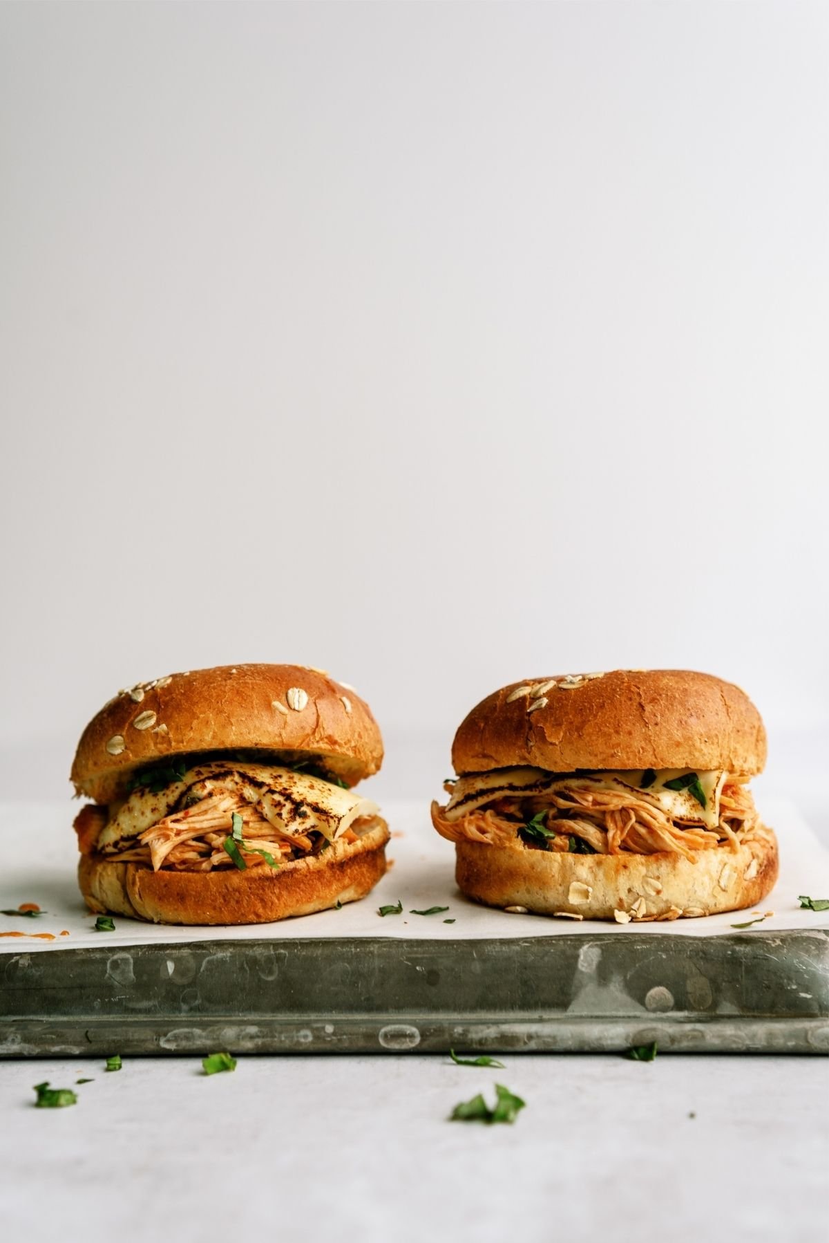 2 Slow Cooker Italian Chicken Sandwiches on a pan