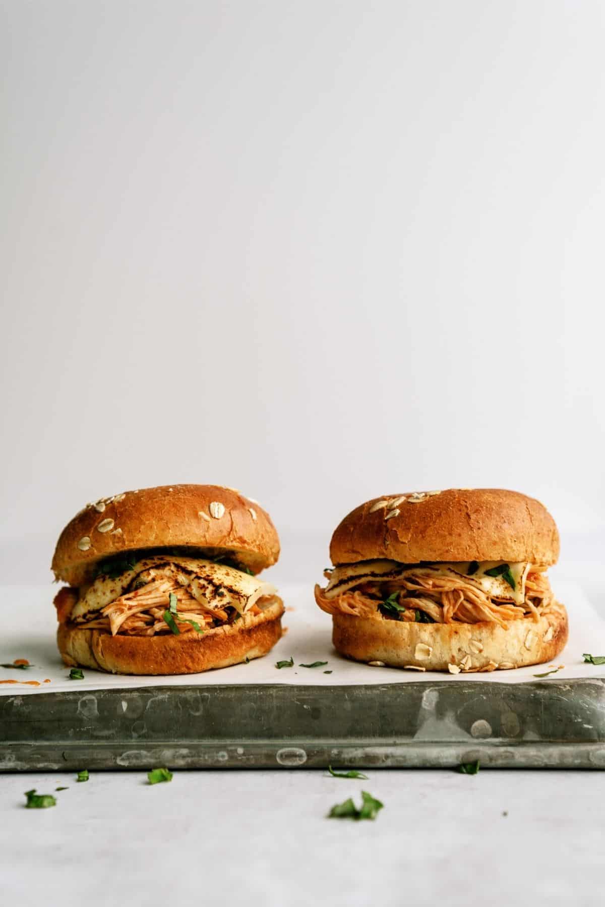 2 Slow Cooker Italian Chicken Sandwiches on a pan