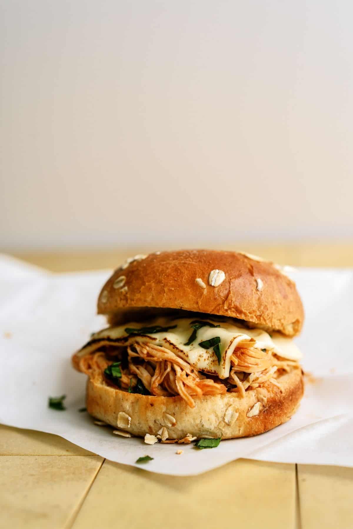 Slow Cooker Italian Chicken Sandwich on a counter