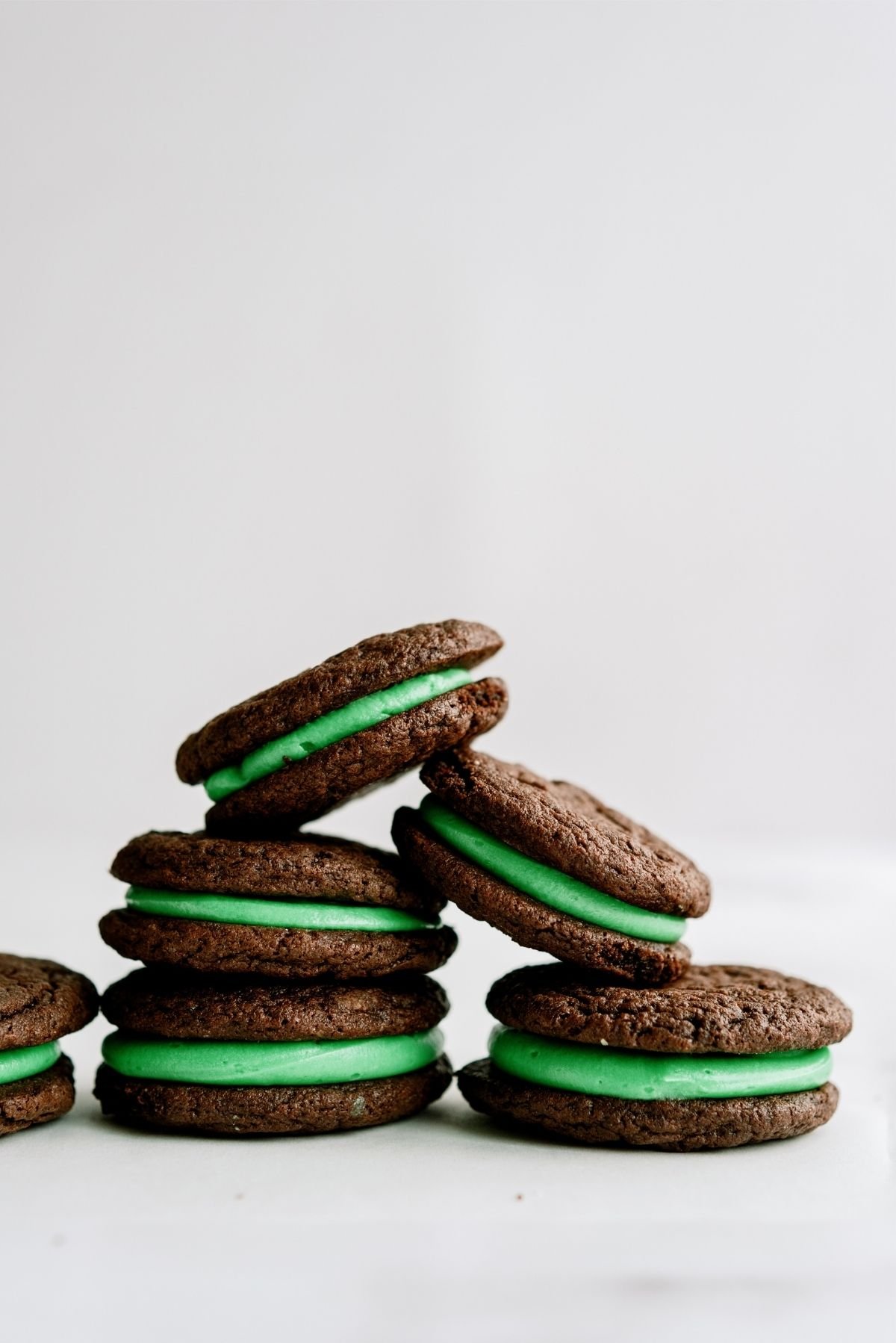 Grasshopper Sandwich Cookies stacked on top of each other