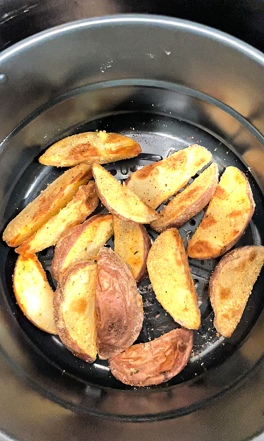 Potato Wedges finished cooking in the air fryer.
