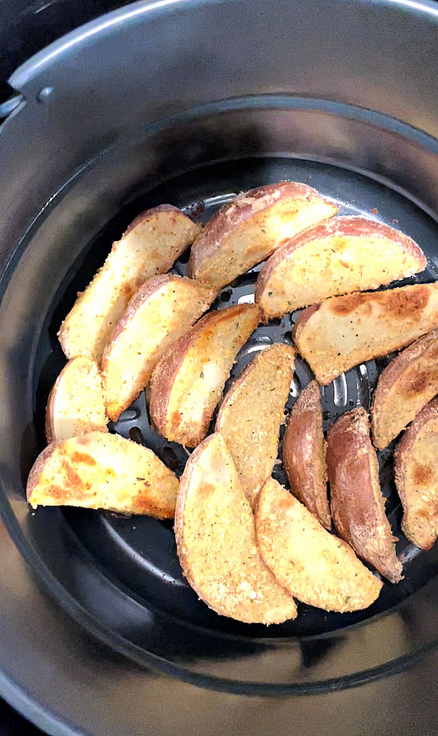 Potato Wedges half cooked in the air fryer