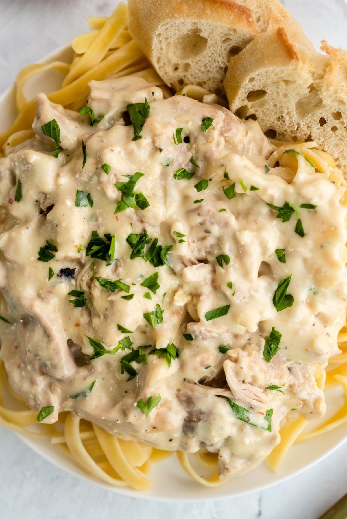 Close up of a plate of Slow Cooker Creamy Chicken Tetrazzini