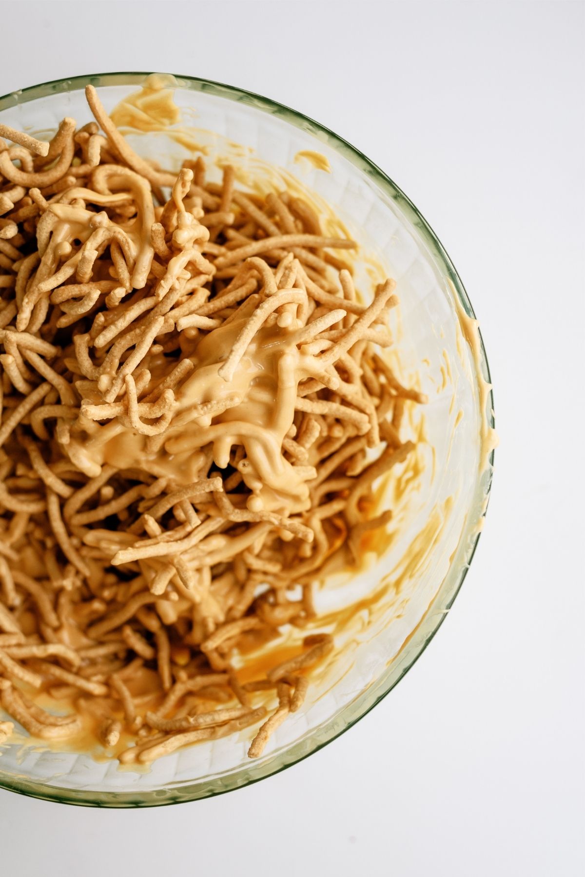 Chow mein noodles mixed in with the butterscotch mixture