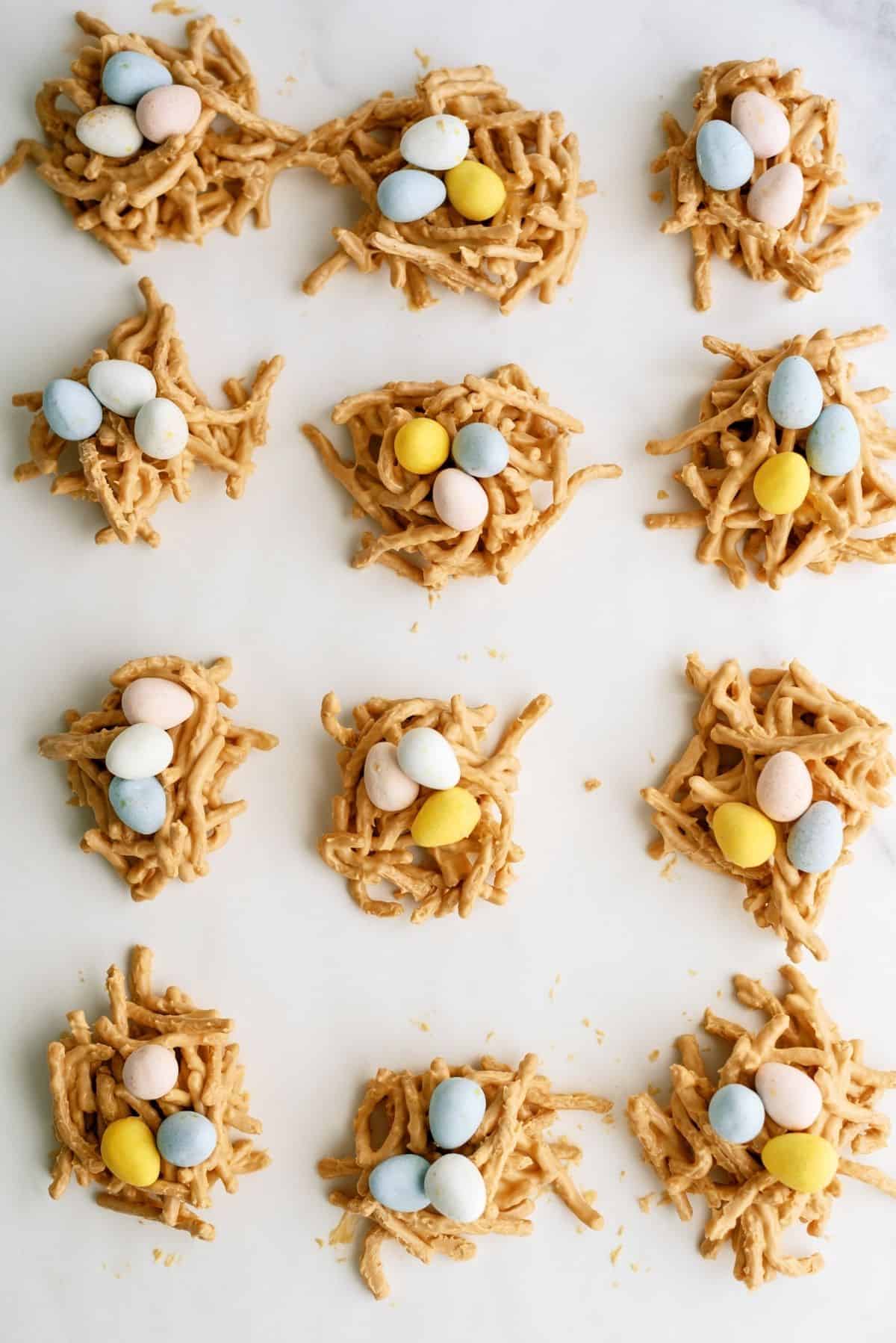 Butterscotch Birds Nest Treats lined up on wax paper