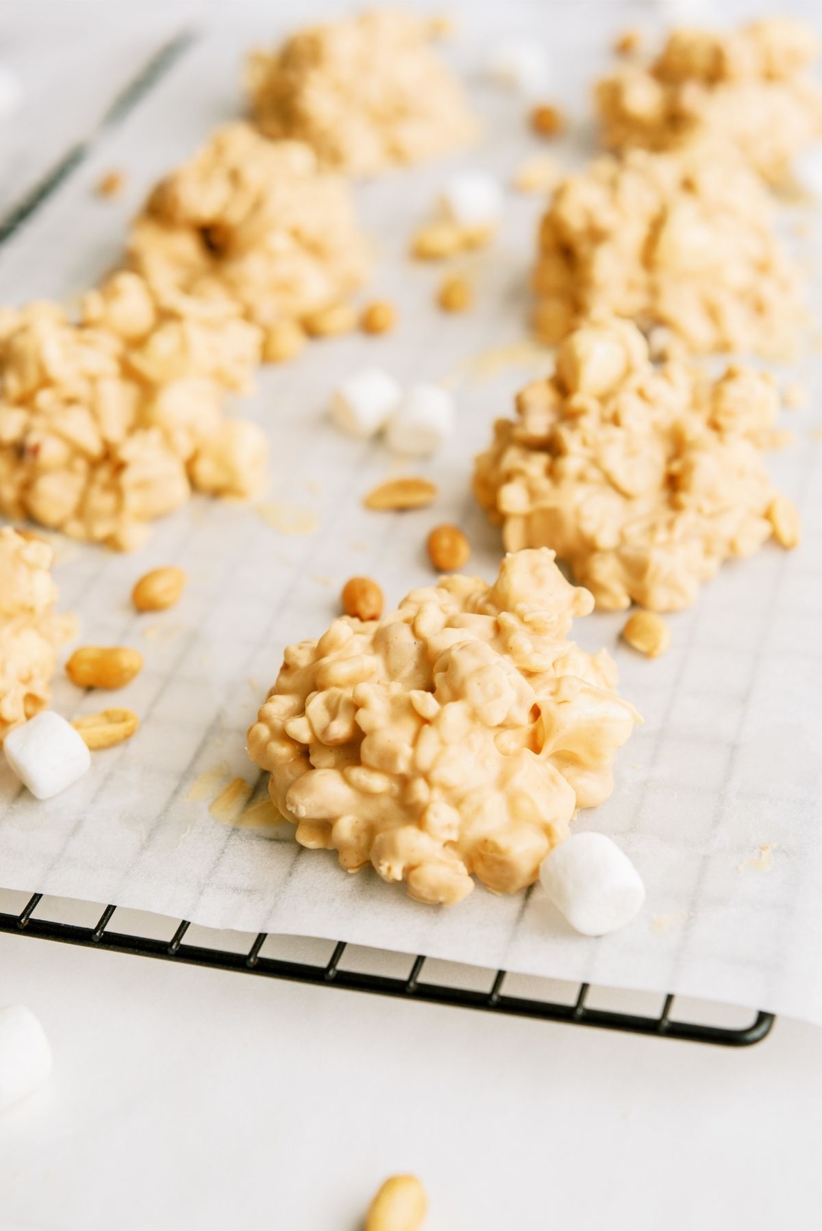 Easy No Bake Fluffernutter Cookies on a cooling rack covered with parchment paper