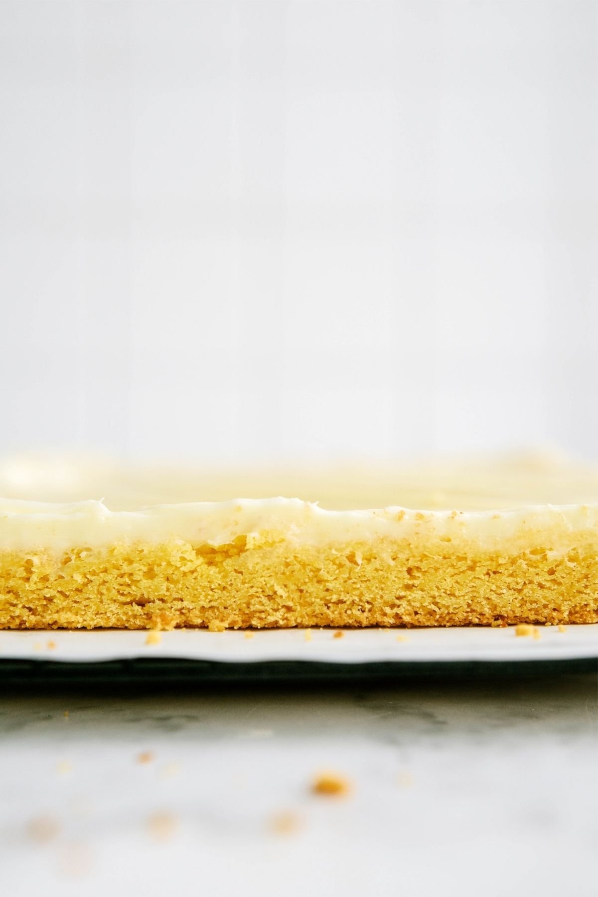 Side view of Frosted Gooey Lemon Bars 