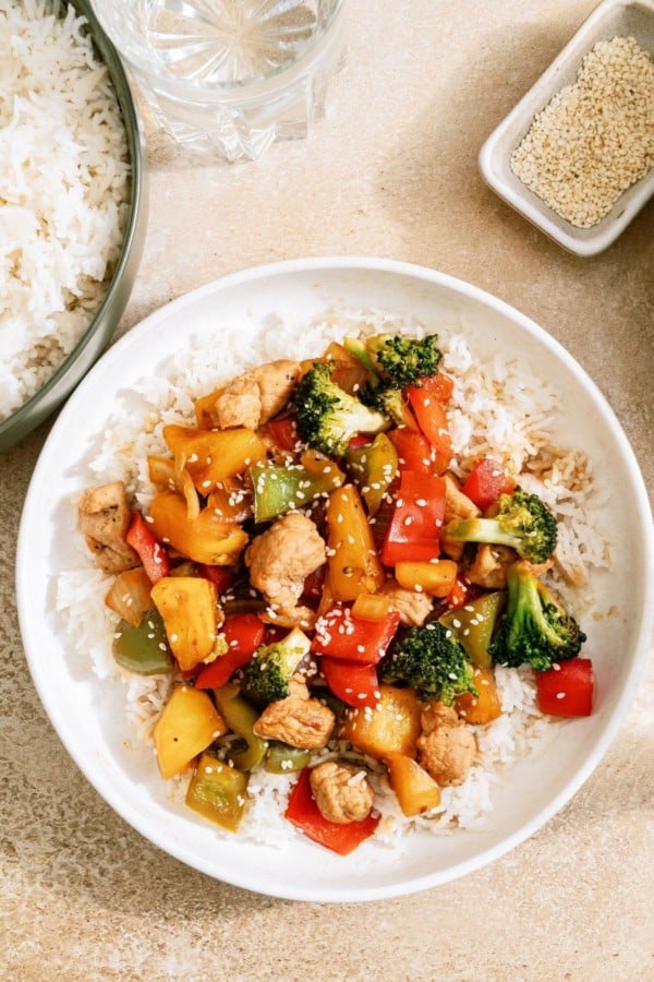 A bowl of Teriyaki Pork Stir Fry served over rice.