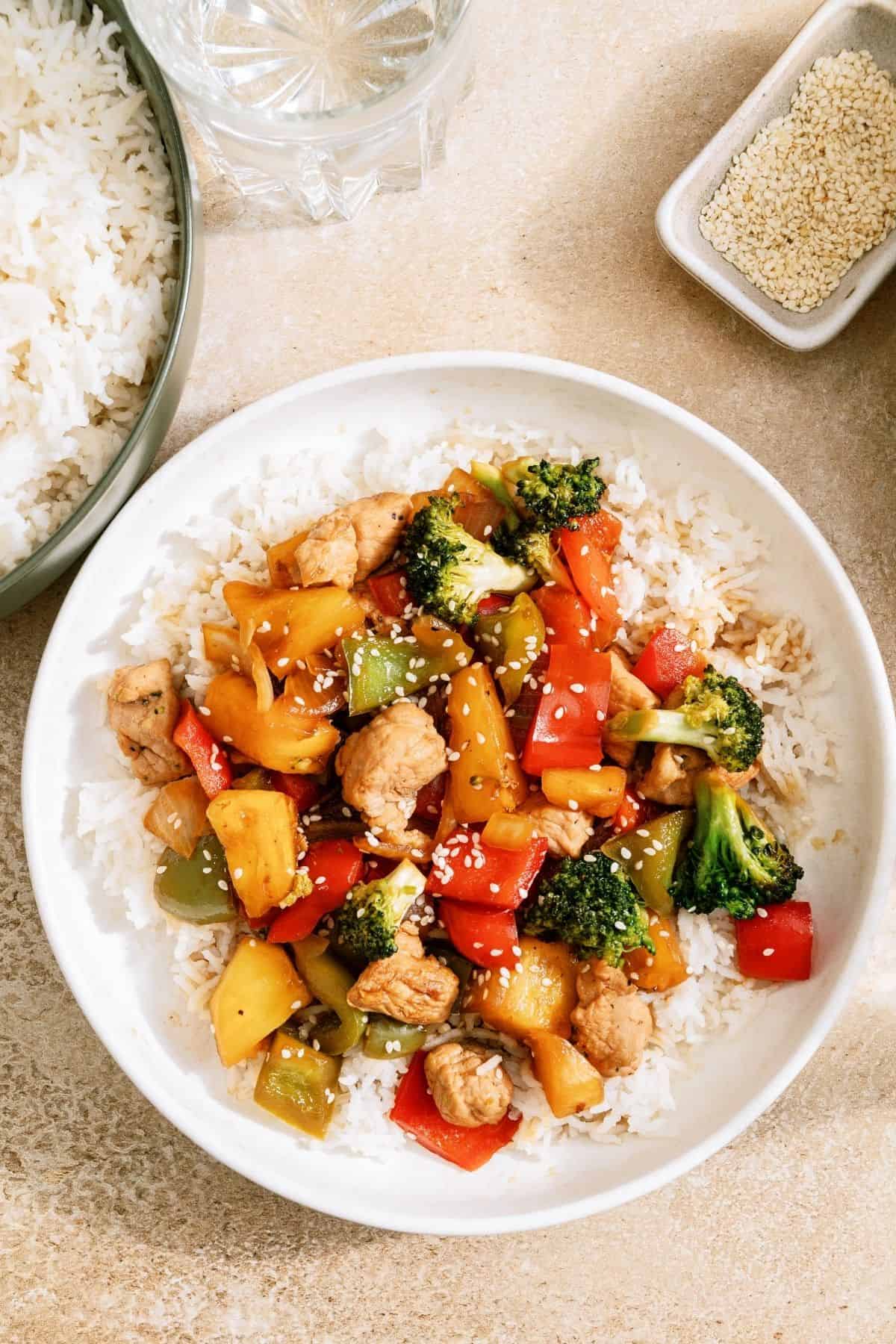 A bowl of Teriyaki Pork Stir Fry served over rice.
