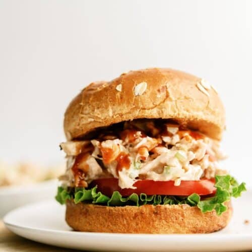 BBQ Chicken Salad Sandwich on a white plate.