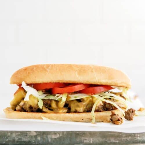 Chopped Cheese Sandwich on top of a sheet pan.