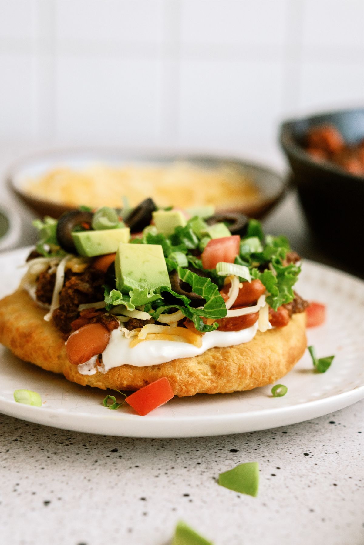 Air Fryer Indian Fry Bread Recipe (Navajo Tacos) on a plate with toppings