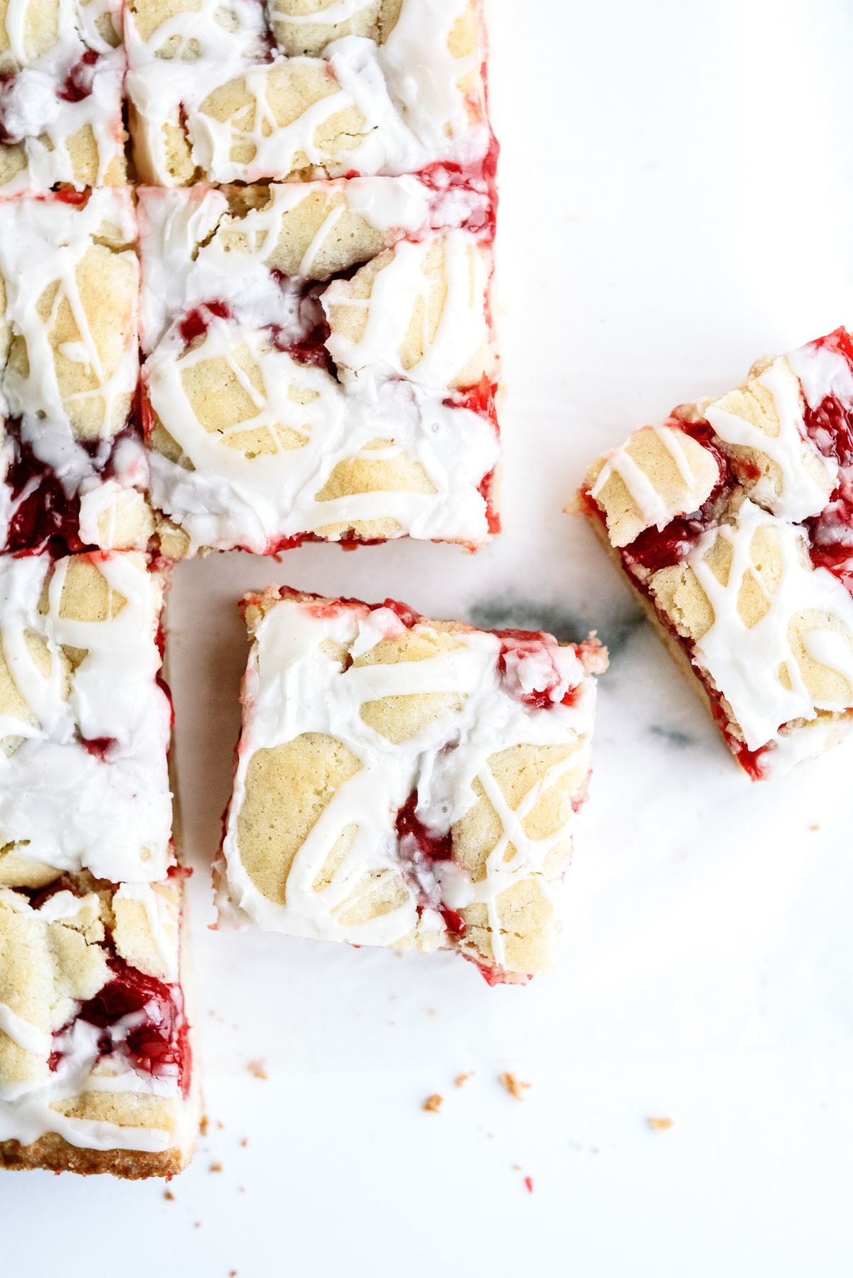 Iced Cherry Pie Bars cut into squares