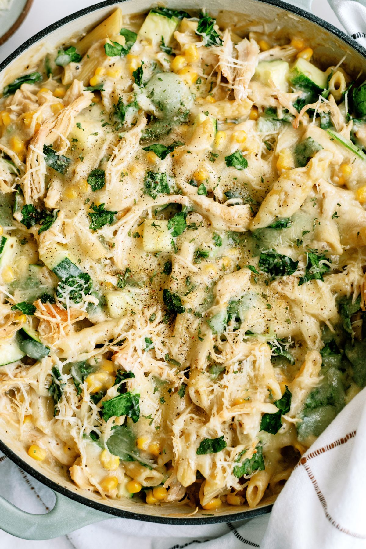 A close up of Chicken Pasta Casserole with Corn and Zucchini in a pan