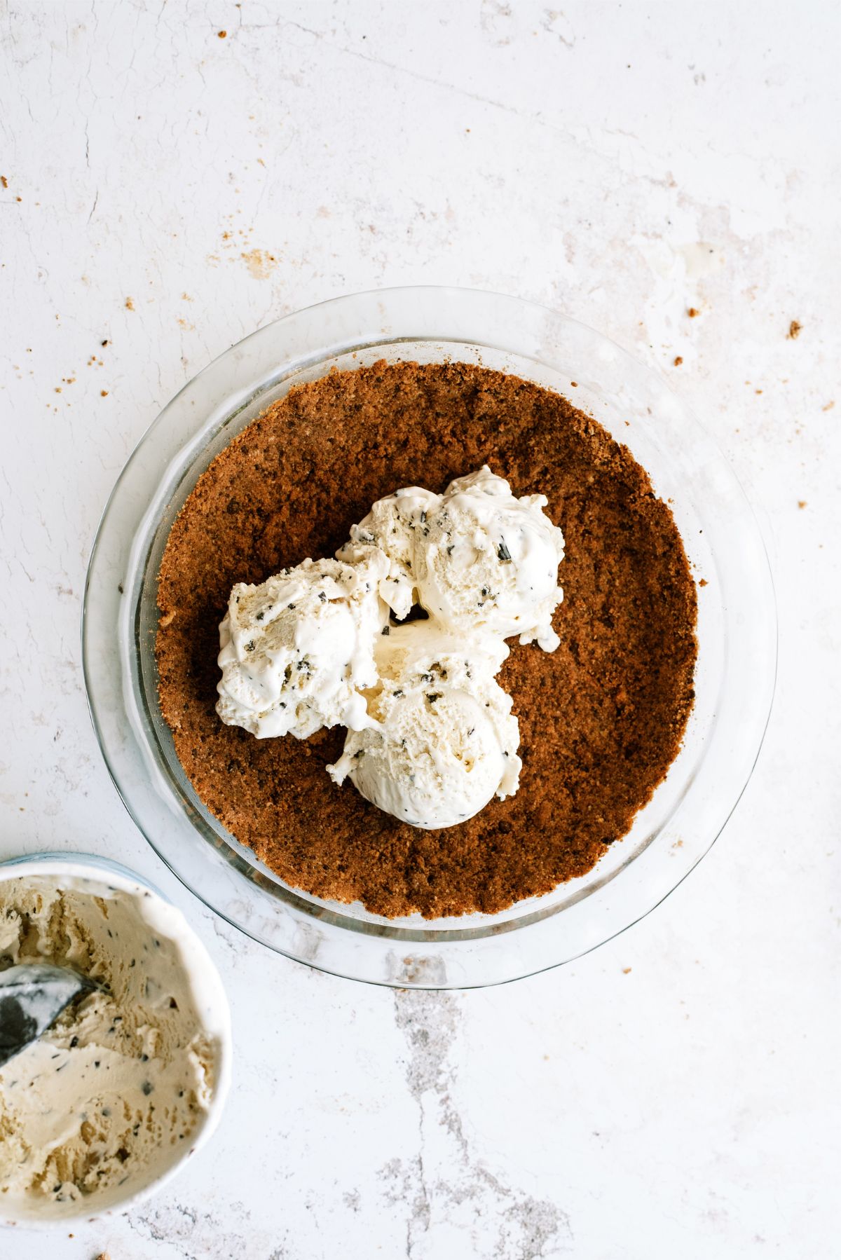 Scoops of Ice Cream on top of the cookie pie crust