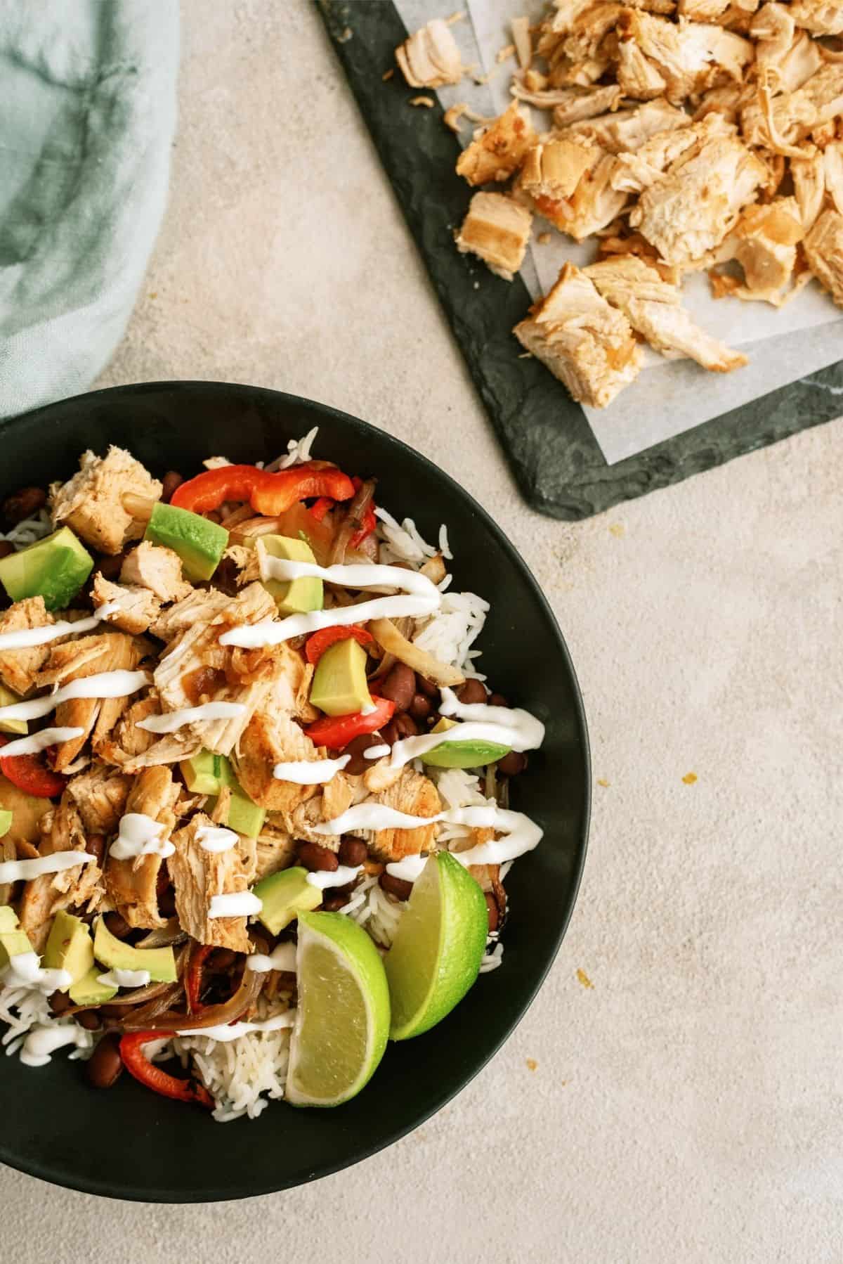 Copycat Chipotle Chicken on a sheet pan and a Chipotle Chicken Bowl