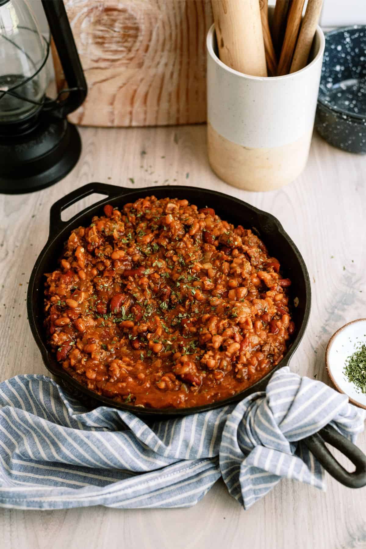 Cowboy Baked Beans in a pan on the counter