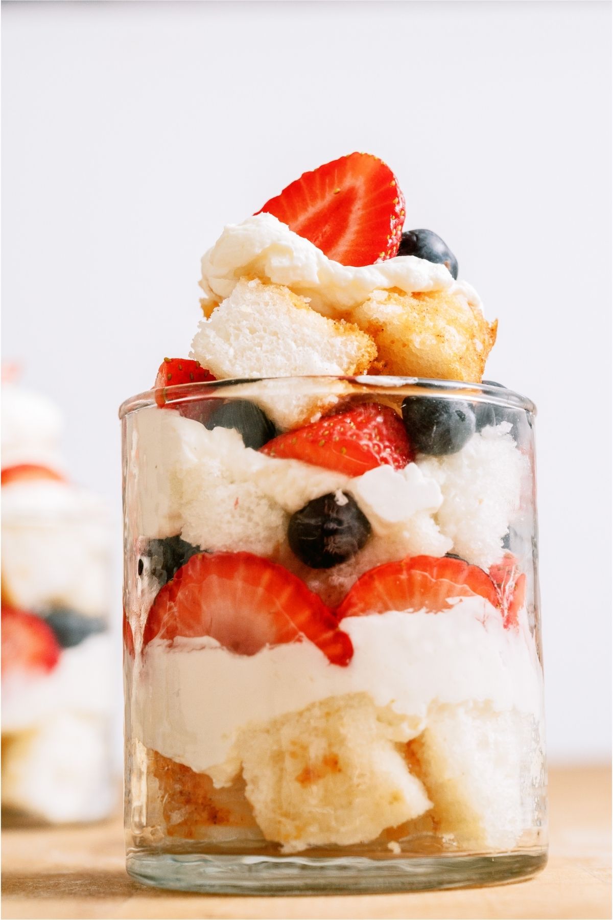 Patriotic Berry Trifle in a cup.