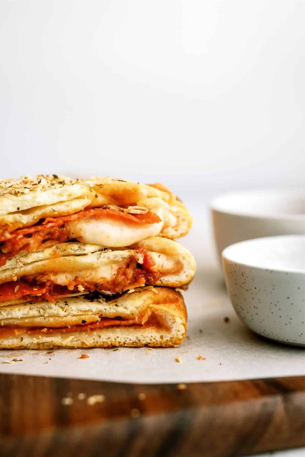 Easy Braided Pizza Loaf sliced and on a plate