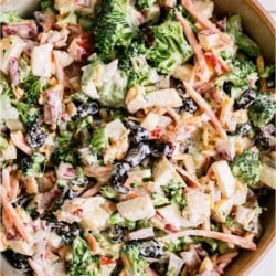 Top view of a serving bowl filled with Loaded Broccoli Salad.