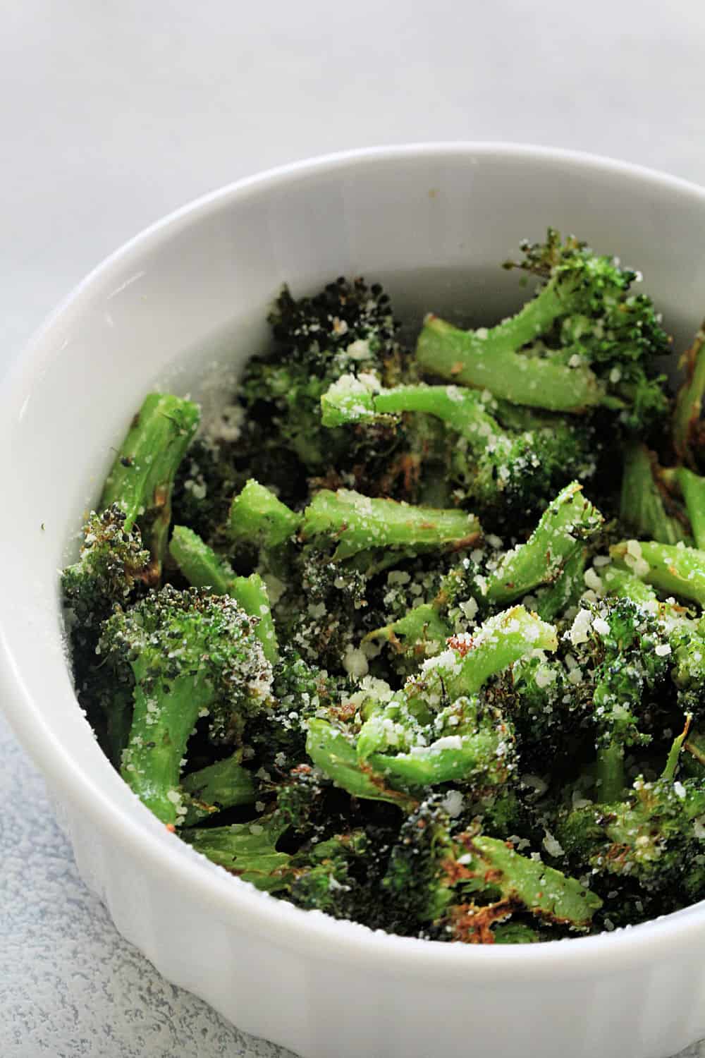 A bowl full of Air Fryer Parmesan Broccoli