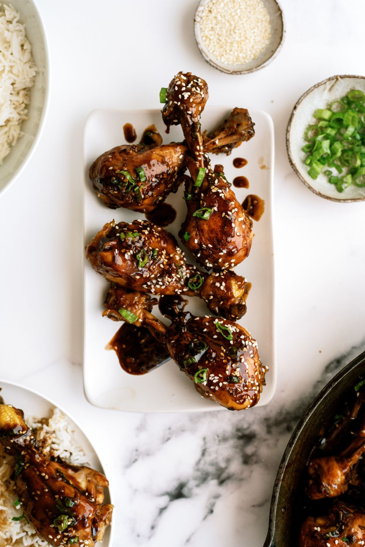 Asian Glazed Chicken Drumsticks on a serving platter