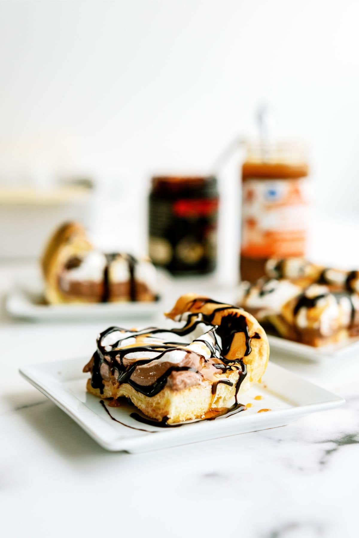 Slices of Cream Puff Cake Dessert on plates