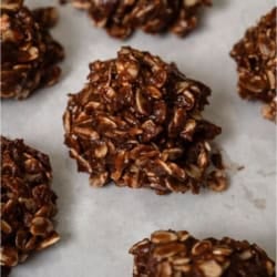 Healthier No Bake Chocolate Peanut Butter Cookies on parchment paper.