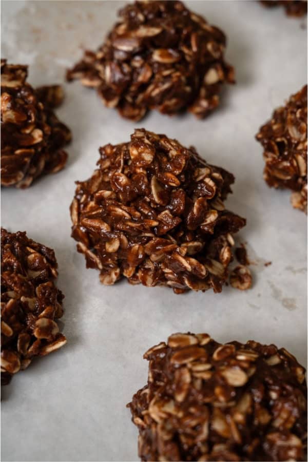 Healthier No Bake Chocolate Peanut Butter Cookies on parchment paper.