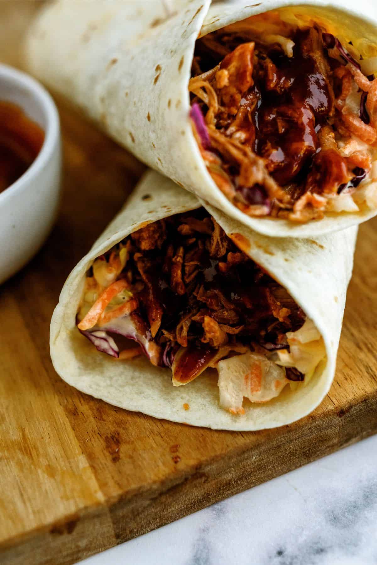 Close up of two Instant Pot Honey BBQ Pork Wraps