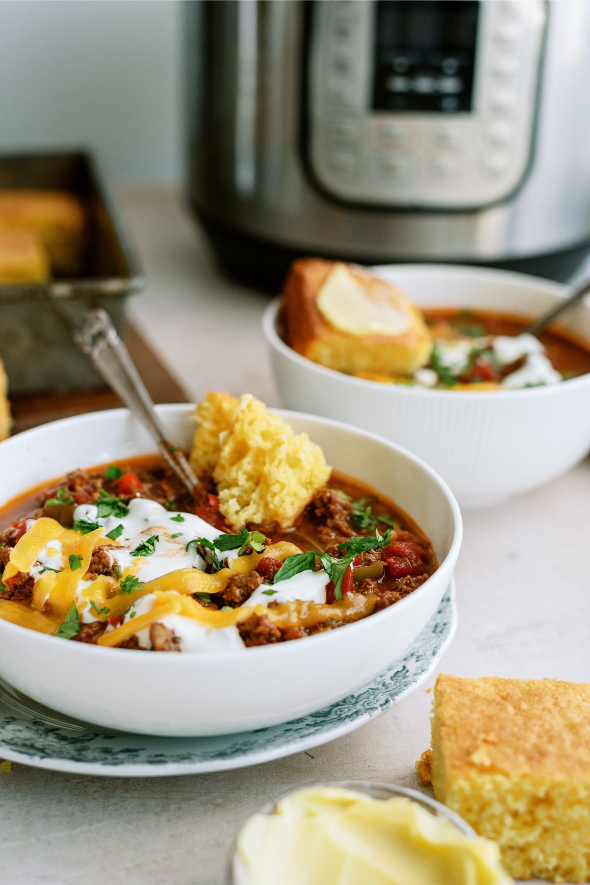 A bowl of Instant Pot No-Bean Chili with Ground Beef with toppings